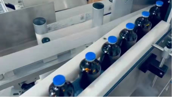 91成人视频淺談立（lì）式圓瓶貼標機發展